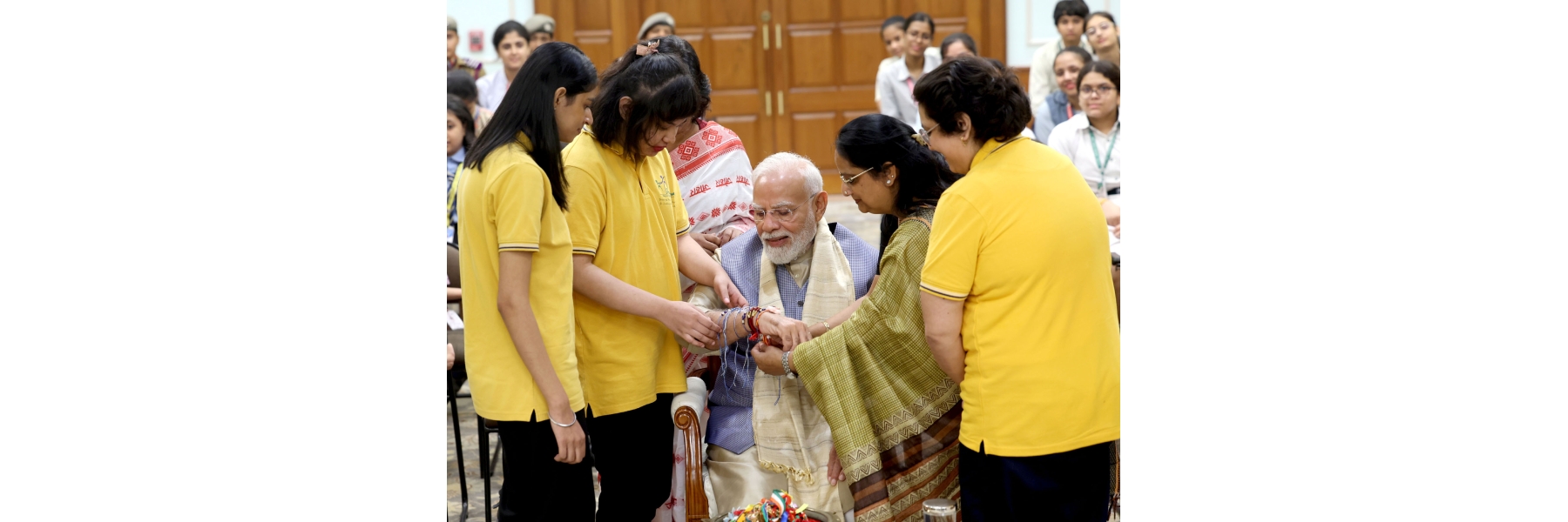 PM celebrates the festival of Raksha Bandhan with children from different schools at his residence (7, Lok Kalyan Marg), in New Delhi.