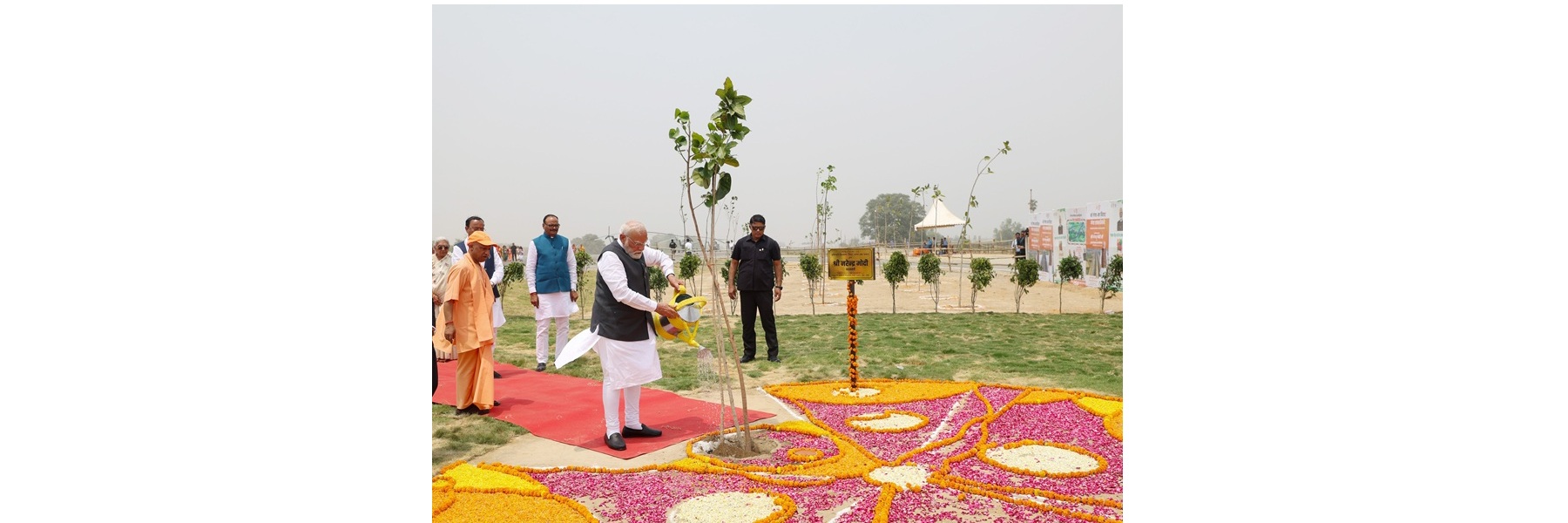 PM planting a sapling at the inauguration of Ganga Expressway at Hardoi, in Uttar Pradesh