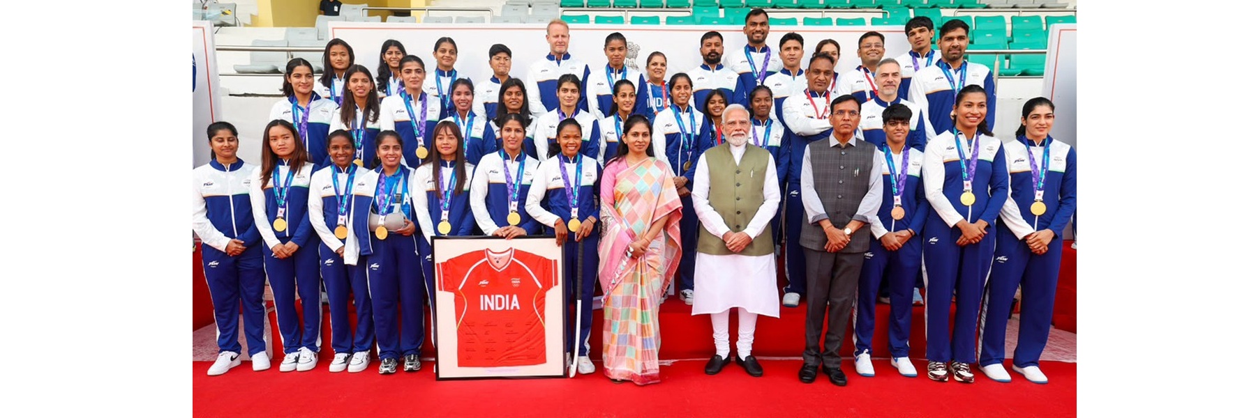 PM in a group photograph with the Indian Contingent for Asian Games 2026, in New Delhi