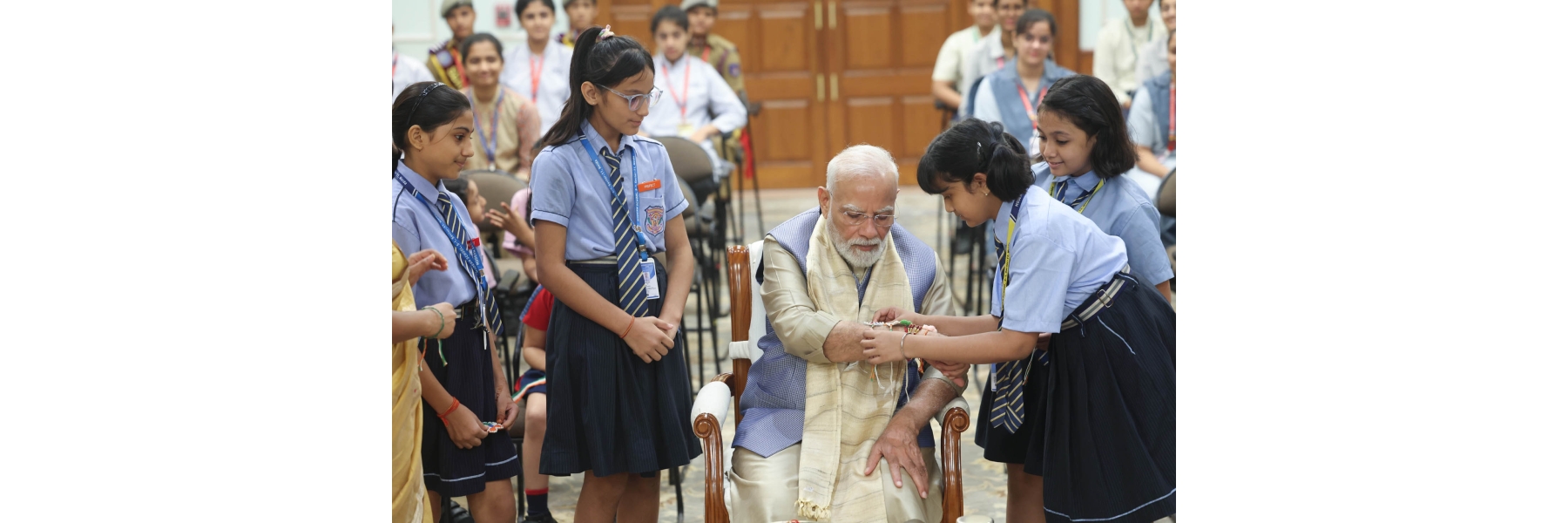 PM celebrates the festival of Raksha Bandhan with children from different schools at his residence (7, Lok Kalyan Marg), in New Delhi.