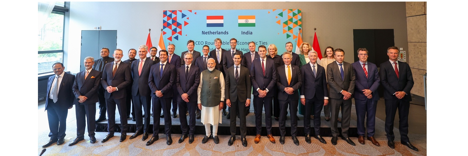 PM in a group photograph with leading Dutch CEOs, in Netherlands